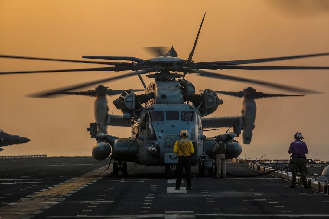 U.S. 5TH FLEET AREA OF OPERATIONS (April 1, 2018) A U.S. Marine Corps CH-53E Super Stallion assigned to Marine Medium Tiltrotor Squadron (VMM) 162, 26th Marine Expeditionary Unit (MEU) prepares to takeoff  while transiting the Bab al-Mandeb Strait aboard the Wasp-class amphibious assault ship USS Iwo Jima (LHD 7), April 1, 2018.