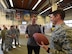 Firefighters from the 86th Civil Engineer Squadron receive autographs from Kyle Rudolph, NFL Minnesota Vikings tight end, after giving him a tour of the firehouse on Ramstein Air Base, Germany, April 6, 2018. The firefighters showed Rudolph how to put on the fire-retardant suit and demonstrated how to use some of the gear they use.