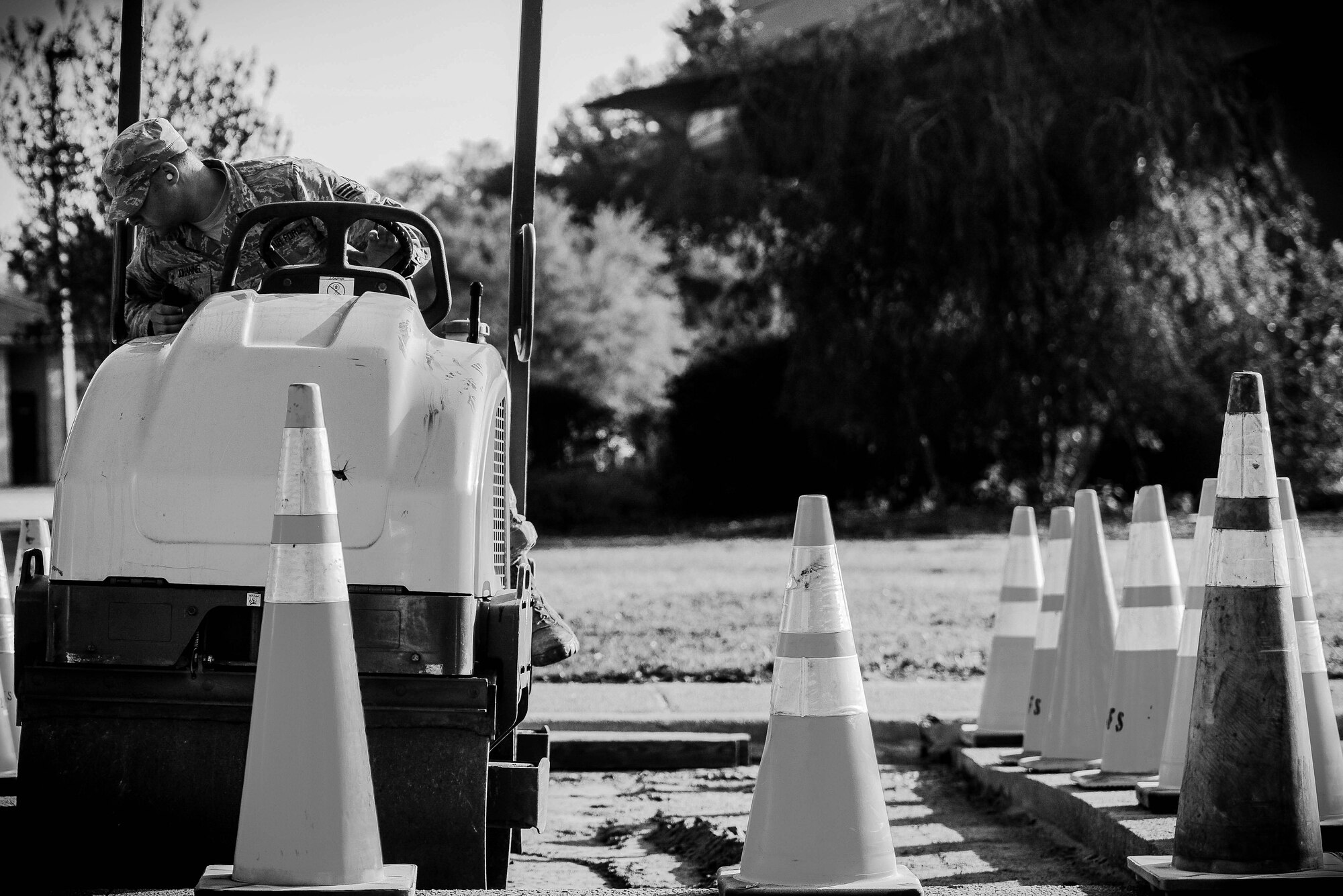U.S. Air Force Senior Airman Reid Johanns, 20th Civil Engineer Squadron pavement and construction journeyman, uses a mini-roller at Shaw Air Force Base, S.C., April 12, 2018.