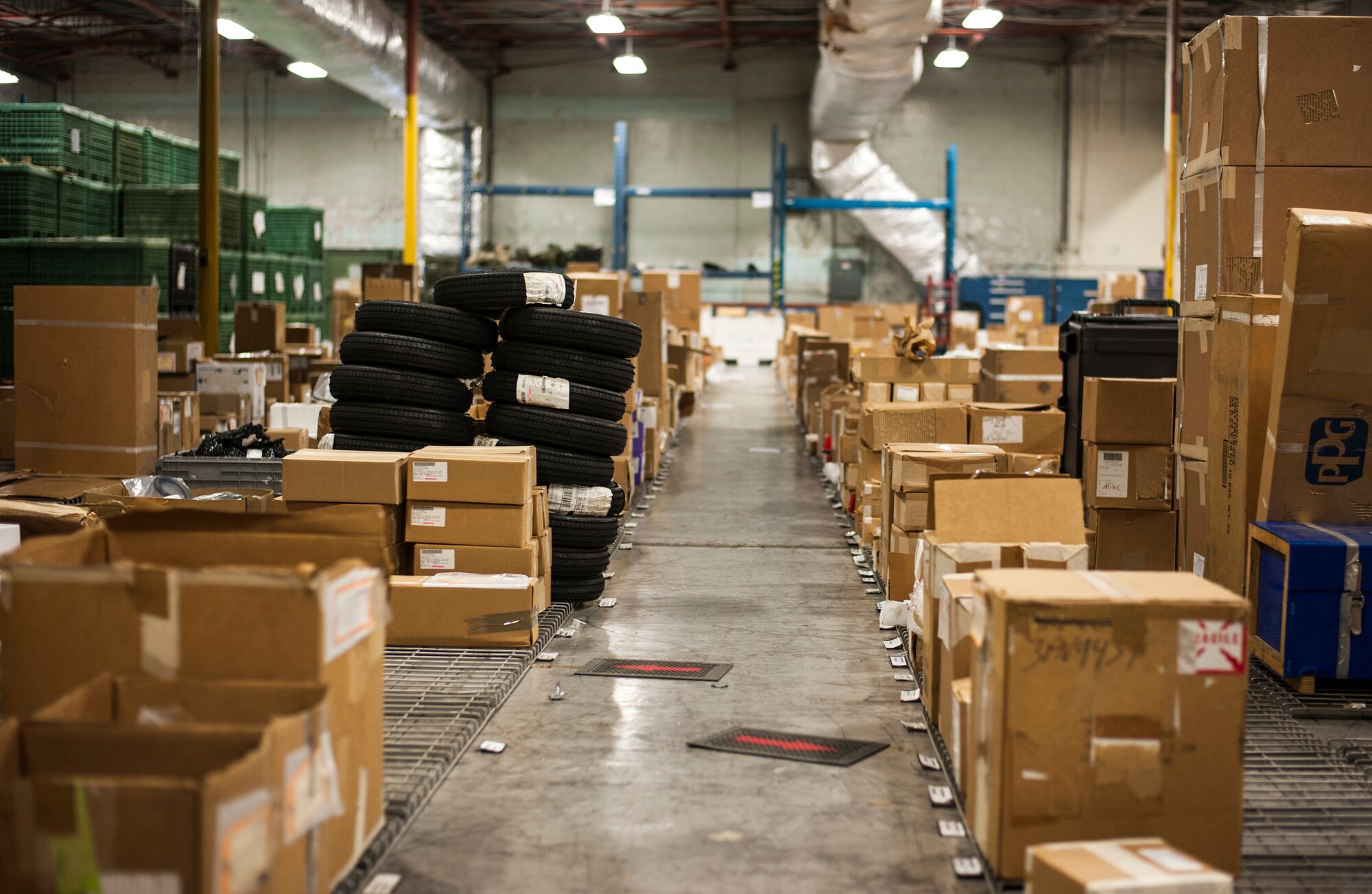 Rows of supply inventory line the floor of the 6th Logistics Readiness Squadron warehouse at MacDill Air Force Base, Fla., April 11, 2018.