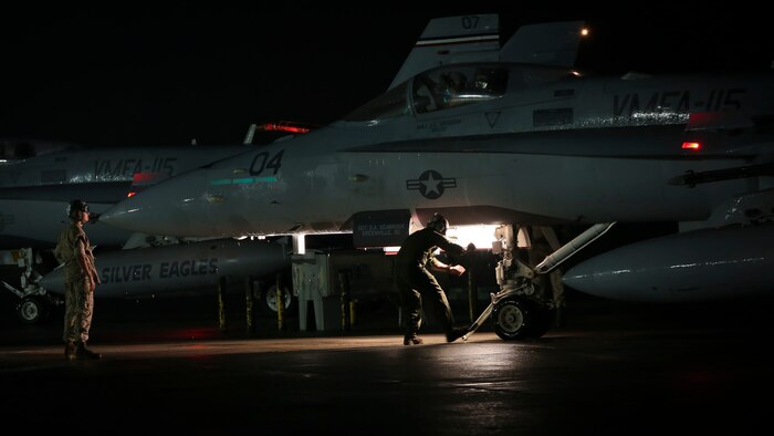 Maintainers prepare an F/A-18C Hornet for takeoff aboard Marine Corps Air Station Beaufort, April 9. The Hornet is with Marine Fighter Attack Squadron 115 and deployed in support of combat operation overseas. While deployed, the squadron will coordinate with our international partners and other branches of the U.S. military in order to ensure the mission is accomplished and freedom is protected.
