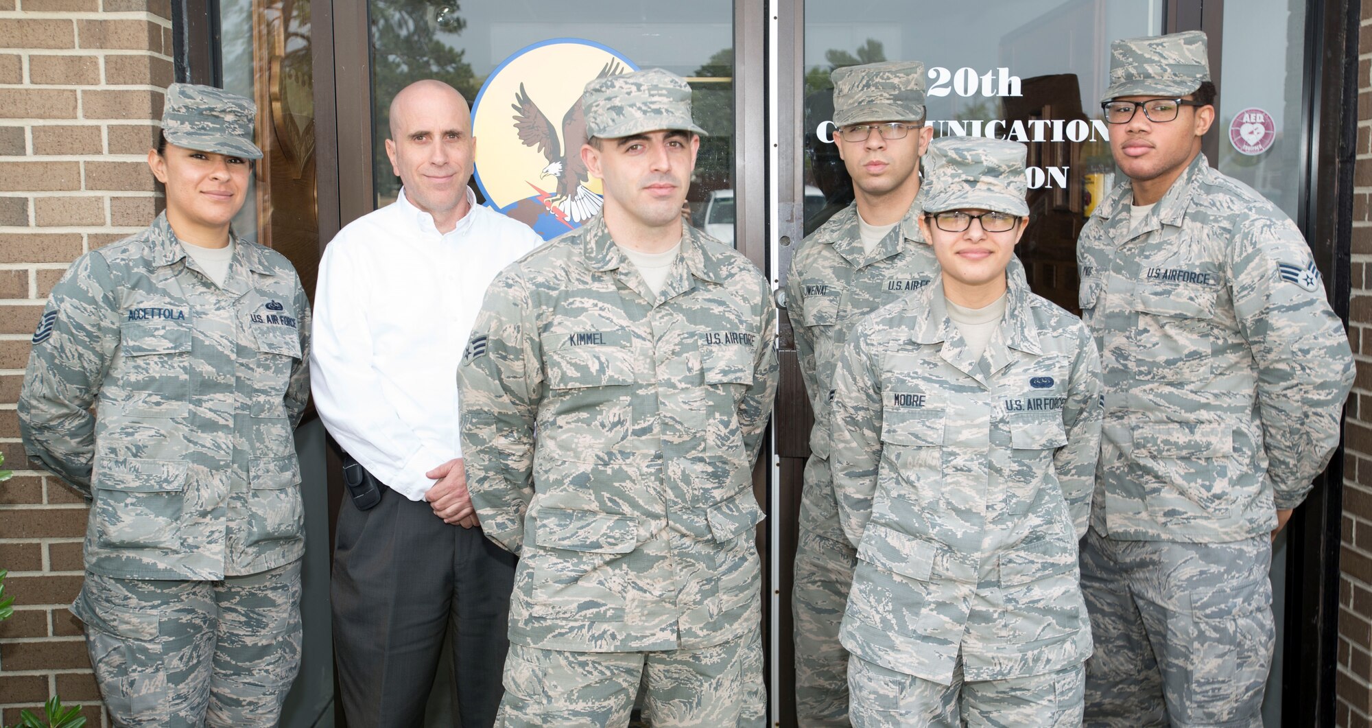 Members of the 20th Communications Squadron mission defense team stand in front of their squadron at Shaw Air Force Base, S.C., April 10, 2018.