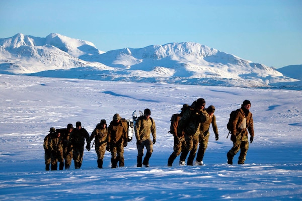 Explosive Ordnance Disposal Mobile Unit 8 and Norwegian army explosive ordnance disposal team participate in cold-weather endurance ruck march during Exercise Arctic Specialist 2017, Ramsund, Norway, February 5, 2017 (U.S. Navy/Seth Wartak)