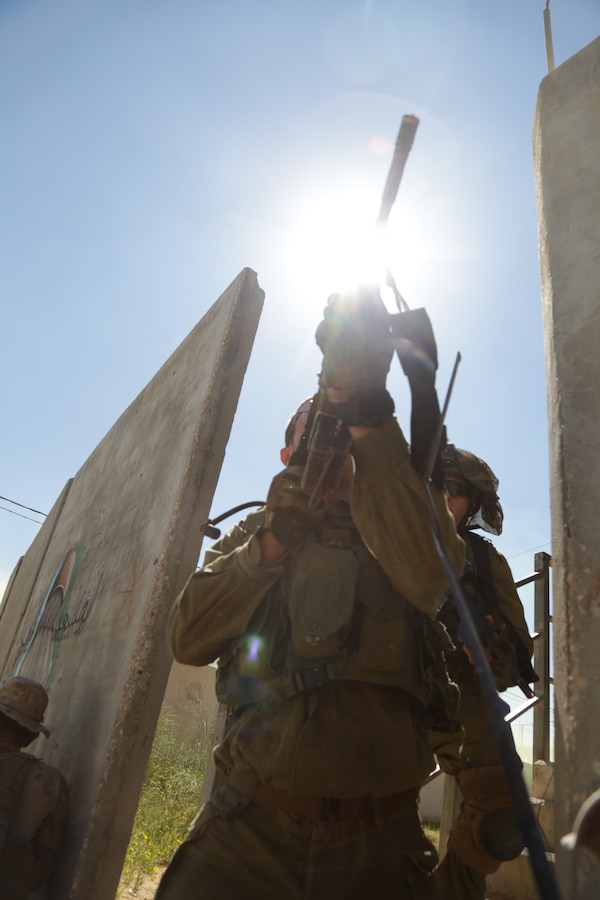NATIONAL TRAINING CENTER, ISRAEL (March 12, 2018) U.S. Marines assigned to Battalion Landing Team, 2nd Battalion, 6th Marine Regiment (BLT 2/6), 26th Marine Expeditionary Unit conduct lane training alongside Israeli soldiers as part of exercise Juniper Cobra, Mar. 12, 2018. The 26th MEU is participating in Juniper Cobra with the Israeli Defense Force in order to improve interoperability and hone both forces’ skills in a variety of environments.