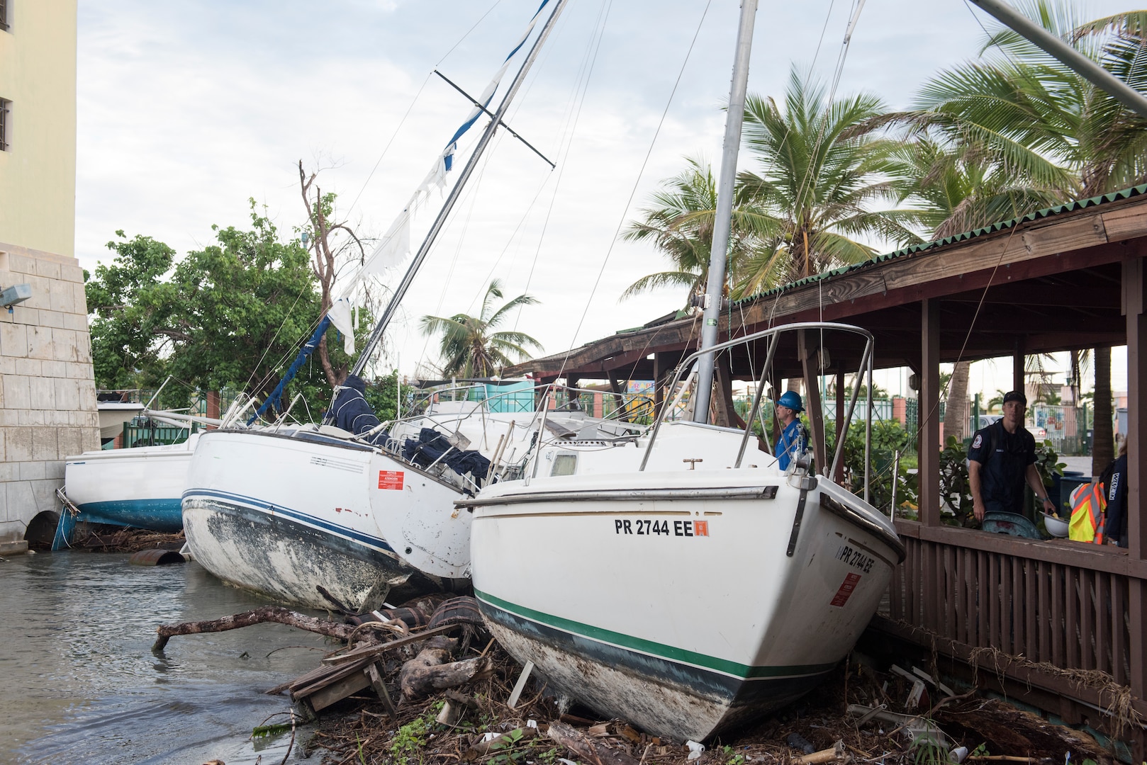 Machinery Technician with Coast Guard Atlantic Strike Team arrives on scene for vessel removal operations in Ponce, Puerto Rico, November 19, 2017
(U.S. Coast Guard/Lauren Steenson)