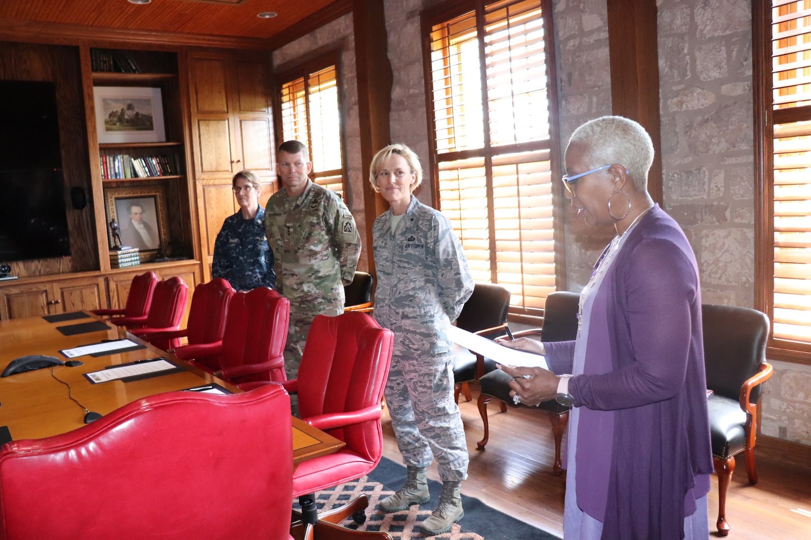 (From left) Rear Adm. Rebecca McCormick-Boyle, commander, Navy Medicine Education, Training and Logistics Command; Lt. Gen. Jeffrey Buchanan, commanding general, U.S. Army North (Fifth Army); and Brig. Gen. Heather Pringle, commander, 502nd Air Base Wing and Joint Base San Antonio listen as Nina Hightower reads the proclamation for the Month of the Military Child April 12. Students, local educators and representatives from the Fort Sam Houston and Lackland Independent School Districts were in attendance to recognize and honor the commitment, contributions and sacrifices children and youth make to the nation.