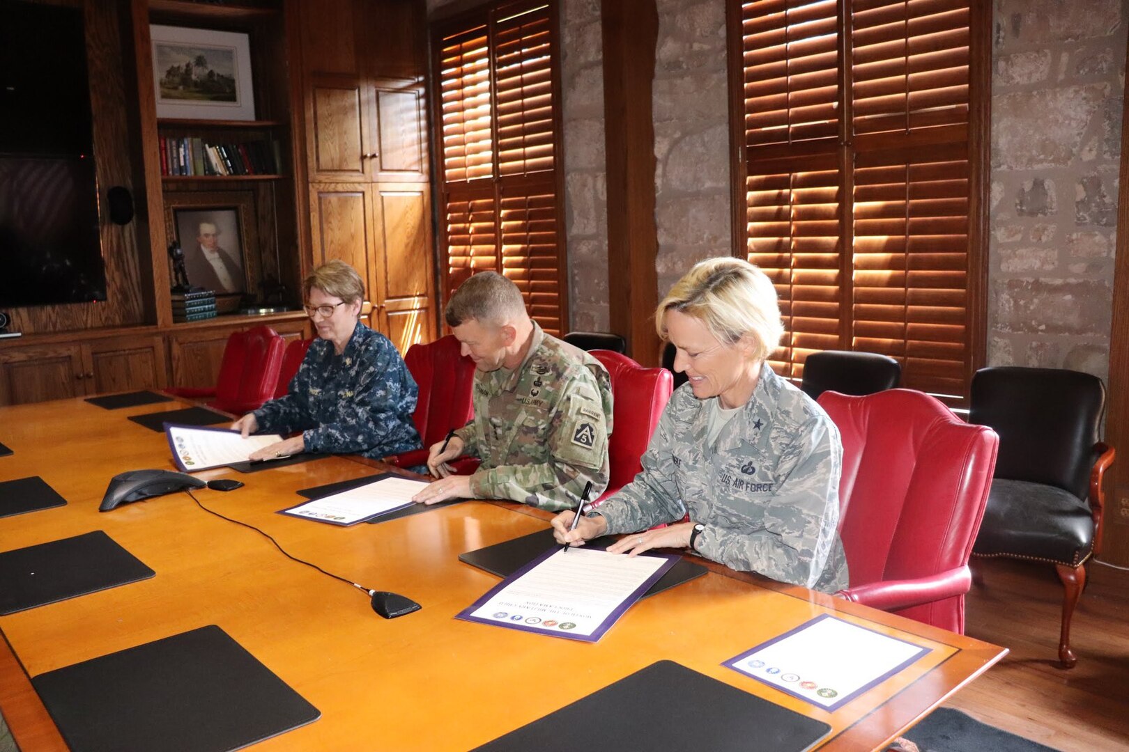 (From left) Rear Adm. Rebecca McCormick-Boyle, commander, Navy Medicine Education, Training and Logistics Command; Lt. Gen. Jeffrey Buchanan, commanding general, U.S. Army North (Fifth Army); and Brig. Gen. Heather Pringle, commander, 502nd Air Base Wing and Joint Base San Antonio joined together April 12 with students, local educators and representatives from the Fort Sam Houston and Lackland Independent School Districts to recognize and honor the commitment, contributions and sacrifices children and youth make to the nation.