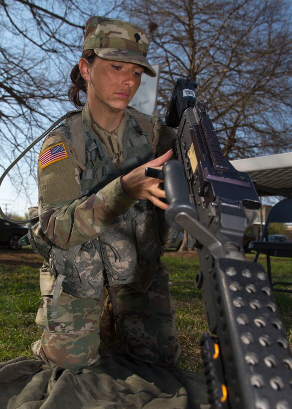 U.S. Army Spc. Natasha Shaw, Medical Department Activity optical lab specialist, inspects a weapon at Joint Base Langley-Eustis, Virginia., April 10, 2018. Soldiers dismantled and reassembled weapons during a timed exercise. (U.S. Air Force photo by Airman 1st Class Monica Roybal)