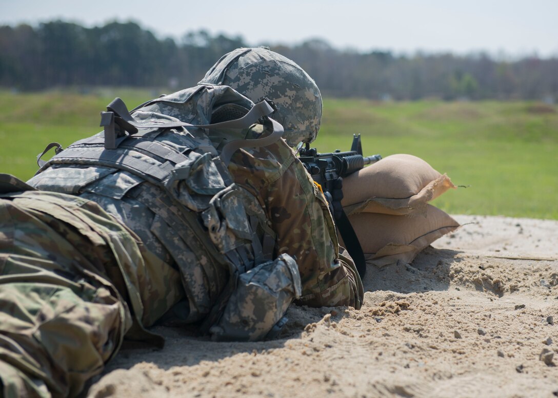 A U.S. Army Soldier fires an M-16 rifle at Joint Base Langley-Eustis, Virginia., April 11, 2018. Soldiers competing in the NCO of the Year and Soldier of the Year Competition were required to shoot at targets from various positions during this exercise. (U.S. Air Force photo by Airman 1st Class Monica Roybal)