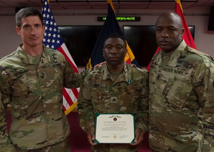 U.S. Army Col. Richard D. Heyward, Center for Initial Military Training deputy commander, U.S. Army Sgt. Tiphine T. Tobo, Headquarters and Headquarters Detachment 10th Battalion, 7th Transportations Brigade (Expeditionary) battalion school NCO in charge, and U.S. Army Command Sgt. Maj. Edward W. Mitchell, Center for Initial Military Training command sergeant major, display the brigade-level NCO of the Year certificate at Joint Base Langley-Eustis, Virginia., April 12, 2018. Tobo was named the brigade-level NCO of the Year (U.S. Air Force photo by Airman 1st Class Monica Roybal)