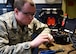 U.S. Air Force Senior Airman Cody Evans, a composite tool kit technician assigned to the 509th Aircraft Maintenance Squadron, fixes communication equipment at Whiteman Air Force Base, Mo., April 10, 2018. The members of the 509th AMXS are responsible for day-to-day maintenance of the B-2 Spirit. (U.S. Air Force photo by Staff Sgt. Danielle Quilla)