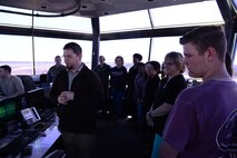Lowndes Young Leaders watch 14th Operations Support Squadron air traffic controllers as they direct aircraft April 10, 2018. On average, 100 freshman apply for the program but only about 20 percent are selected. (U.S. Air Force photo by Airman 1st Class Beaux Hebert)