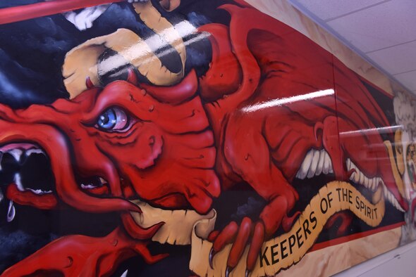 A mural of red dragon that represents the 509th Aircraft Maintenance Squadron at Whiteman Air Force Base, Mo., April 10, 2018. The 509th AMXS Airmen deliver maximum combat readiness while maintaining a deployable combat force capable of projecting B-2 Spirit global firepower at a moments notice, anytime and anywhere. (U.S. Air Force photo by Senior Airman Jovan Banks)