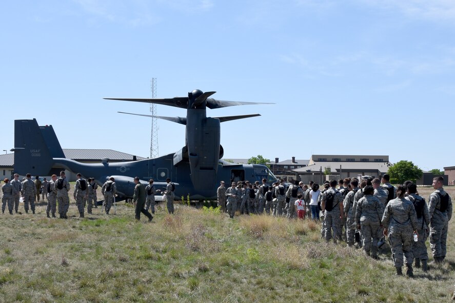 Airmen line up to tour the CV-22 Osprey from the 20th Special Operations Squadron on Goodfellow Air Force Base, Texas, April 11, 2018. Goodfellow intelligence trainees were shown what they may work on in the future and also joined a question and answer session as well as other opportunities allowing them to see how they fit into the Air Force’s strategic goals.