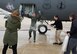 The children of Col. James P. Ryan, retired 157th Air Refueling Wing commander, spray him with champagne and fire extinguishers, part of the aviator's tradition known as the fini-flight, on Feb. 23, 2018 at Pease Air National Guard Base, N.H. Ryan flew his last flight in a KC-135 Stratotanker less than two months before his retirement. (N.H. Air National Guard photo by Staff Sgt. Kayla White)