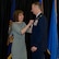 Mary Ellen, wife of Col. James P. Ryan, retired, 157th Air Refueling Wing commander, pins his retirement pin to his jacket on April 07, 2018 at Pease Air National Guard Base, N.H. Ryan retired after more than 30 years of service. (N.H. Air National Guard photo by Airman 1st Class Victoria Nelson)