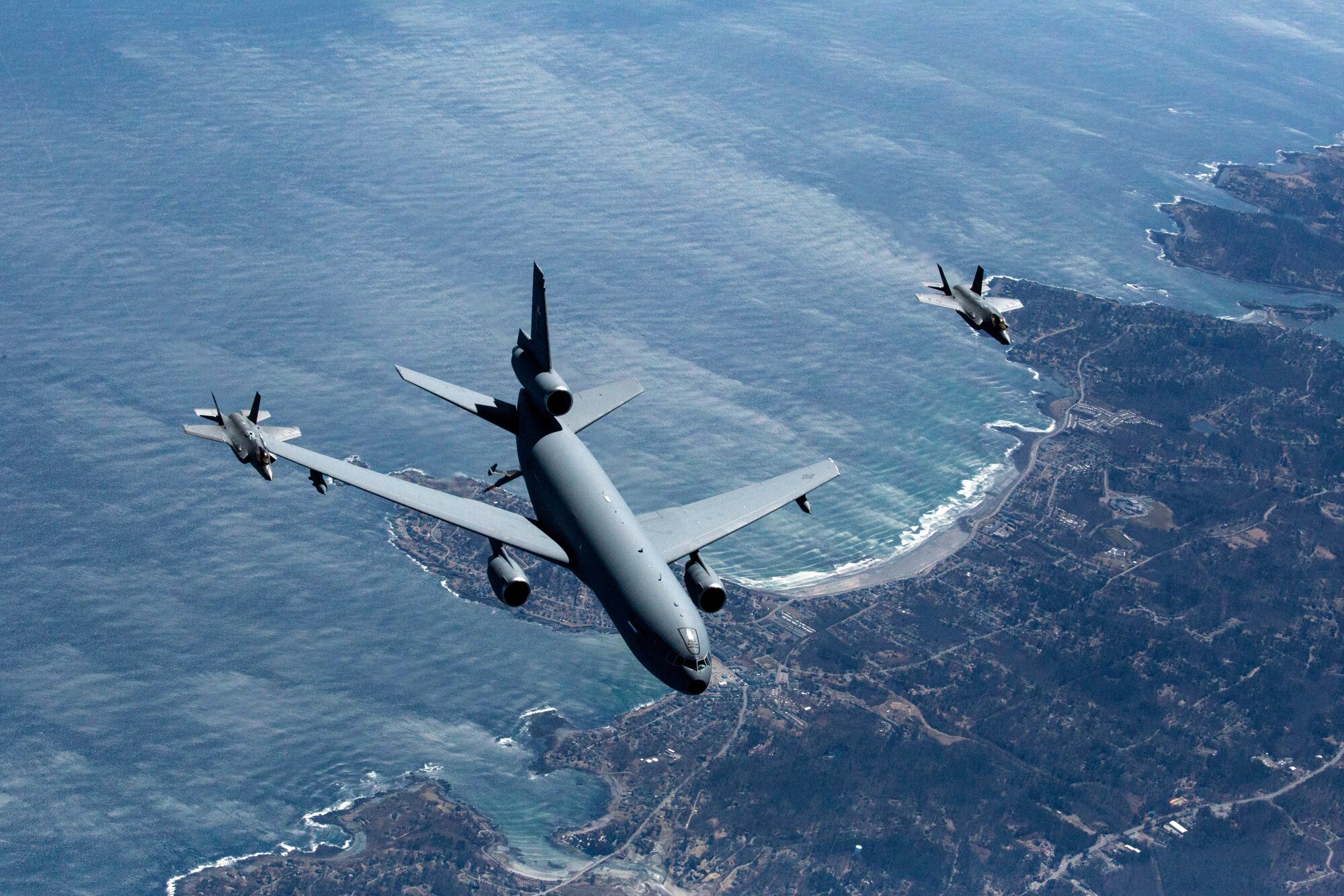 F-35 pilots from the 419th Fighter Wing fly alongside a KC-10 Extender April 7, 2018, near Joint Base McGuire-Dix-Lakehurst, N.J.