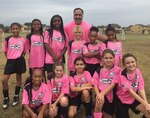 Scott Lee Denson, a volunteer youth coach for Joint Base San Antonio with Team Awesome after a soccer game, November 4, 2017. Denson volunteers to coach his daughter and a team of nine and ten year old girls throughout JBSA through the Alamo Heights Fort Sam Houston Soccer Club.