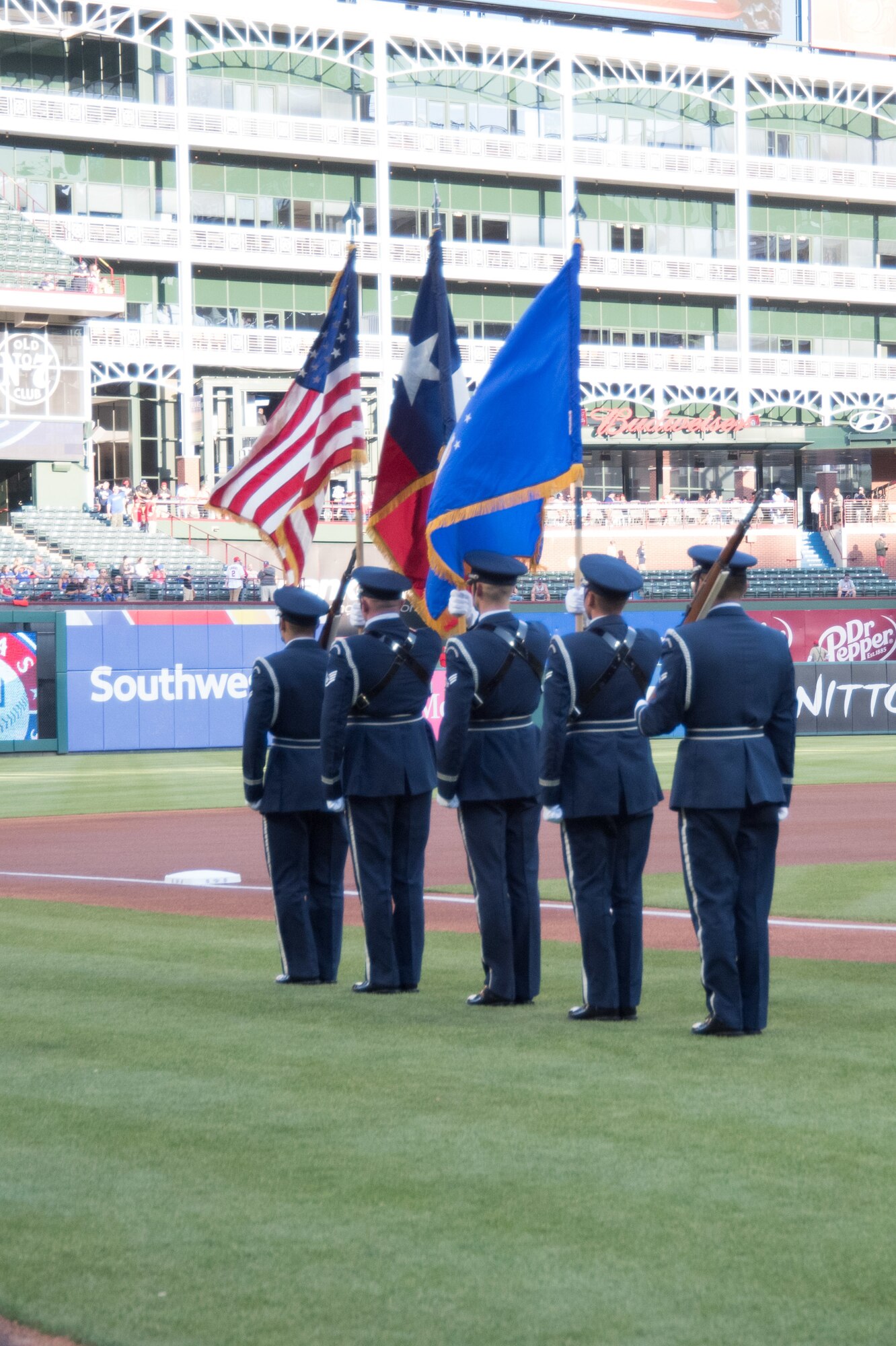 In celebration of Air Force Reserve's 70th Birthday, Maj. Gen. Ronald B. Miller threw out the first pitch at the Texas Rangers game against the Los Angeles Angels. The Dyess Air Force Base Honor Guard presented the colors for the game as well.