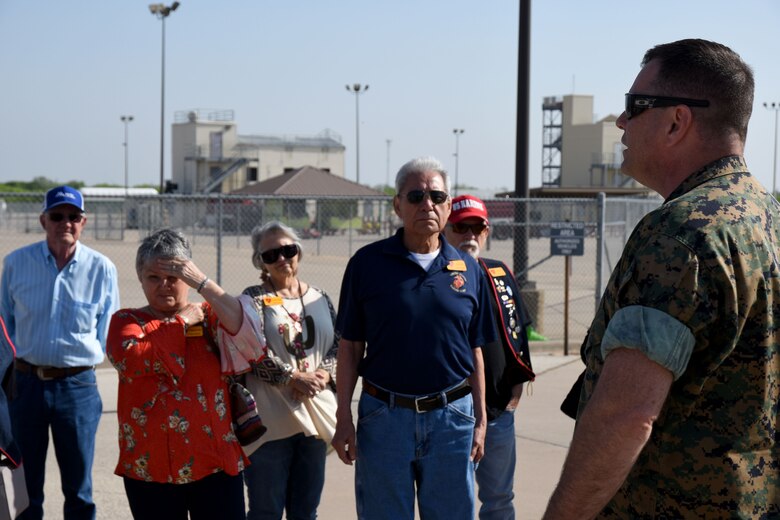 U.S. Marine Corps Master Sgt. Raymond Secoy, staff non-commissioned officer in charge of Marine Corps Fire School, explains the various courses offered at the Louis F. Garland Department of Defense Fire Academy to members of the Texas chapter of the 3rd Marine Division Association on Goodfellow Air Force Base, April 13, 2018. The members were able to watch exercises in progress and look into various facilities designed for training. (U.S. Air Force photo by Airman 1st Class Seraiah Hines/Released)