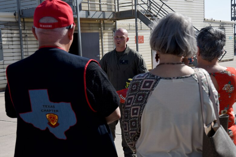 U.S. Marine Corps Shawn Litchfield, Marine Fire School instructor, brief members of the Texas chapter 3rd Marine Division Association on a fire exercise before commencing the exercise with students at the Louis F. Garland Department of Defense Fire Academy on Goodfellow Air Force Base, Texas, April 13, 2018. After the brief the members were able to watch students training in action. (U.S. Air Force photo by Airman 1st Class Seraiah Hines/Released)