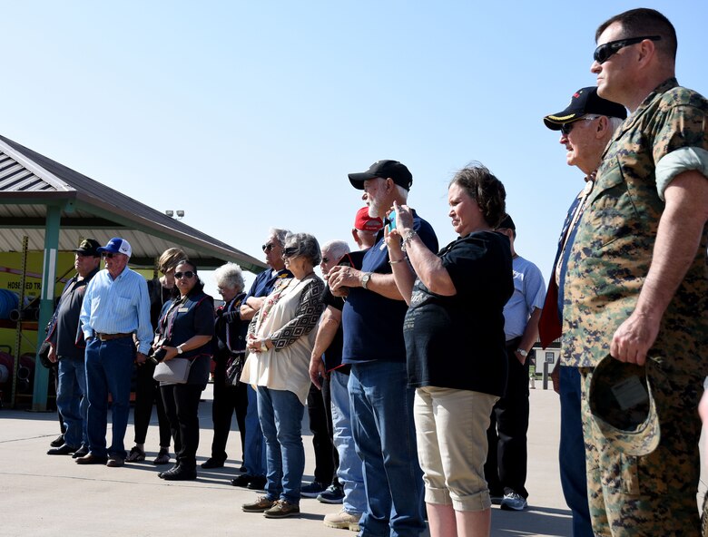 Members from the Texas chapter of the 3rd Marine Division Association observe a fire protection specialist exercise in action at the Louis F. Garland Department of Defense Fire Academy on Goodfellow Air Force Base, Texas, April 13, 2018. The members were able to watch the exercise during a tour given of the base. (U.S. Air Force photo by Airman 1st Class Seraiah Hines/Released)