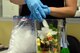 A 56th Medical Group health promotions member puts smoothie ingredients into a blender at Luke Air Force Base, Ariz., April 5, 2018. The 56th MDG is celebrating National Nutrition Month by inspiring Thunderbolts to eat healthier and promoting overall wellness. (U.S. Air Force photo by Senior Airman Devante Williams)