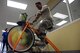 An Airman from the 62nd Aircraft Maintenance Unit powers a blender with a stationary bike during 56th Medical Group health promotion at Luke Air Force Base, Ariz., April 5, 2018. The 56th MDG is celebrating National Nutrition Month, which is themed “Go Further with Food.” The campaign focuses on the importance of making informed food choices and developing sound eating and exercising habits. (U.S. Air Force photo by Senior Airman Devante Williams)