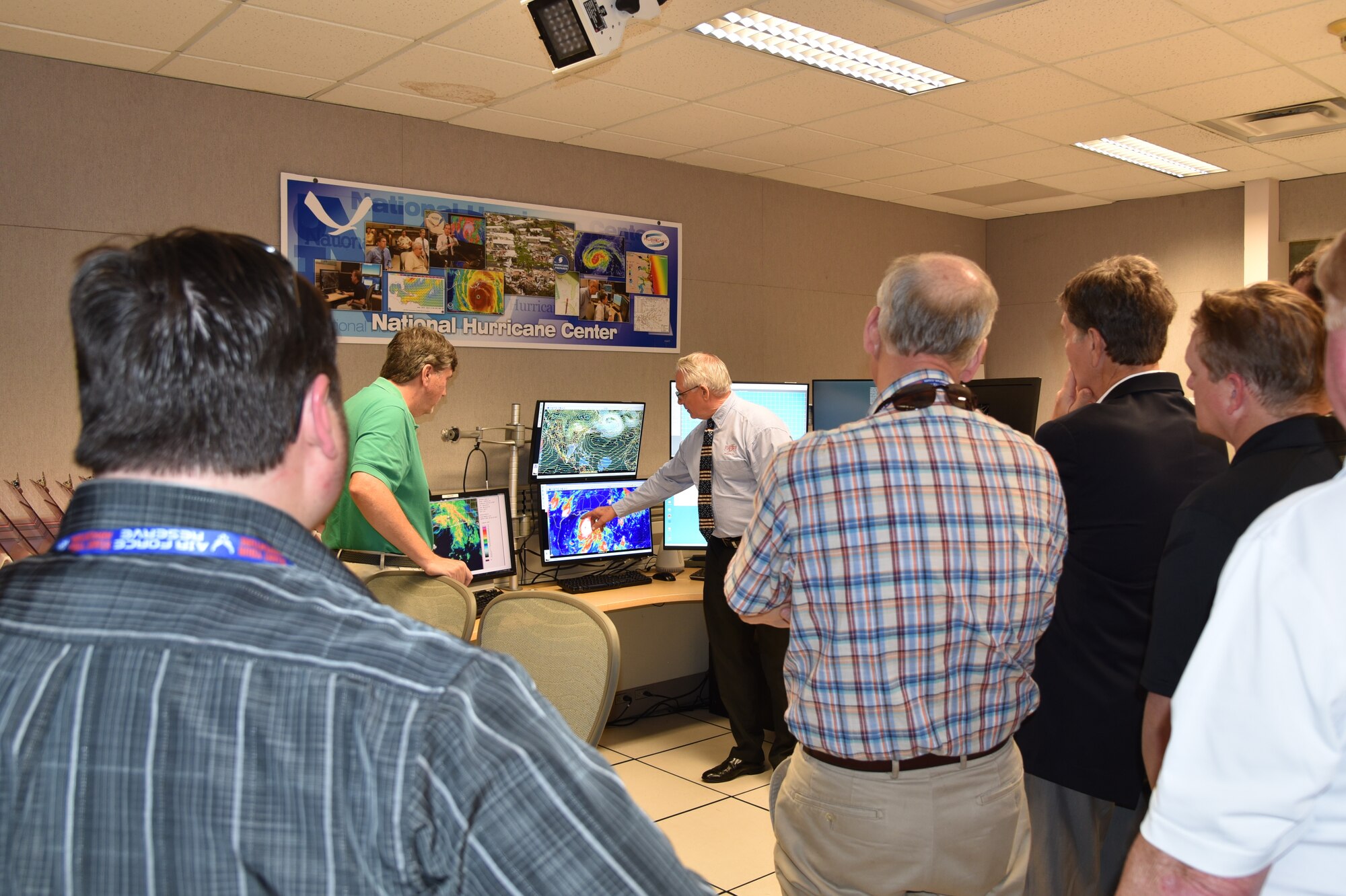 Stacy Stewart, National Hurricane Center senior hurricane specialist, briefs Mississippi Gulf Coast civic leaders on the forecast specialty area of the NHC. The civic leaders also toured Naval Air Station Key West and Homestead Air Reserve Base in Florida, April 12-13, 2018 during a civic leader tour designed to inform local business owners and local leaders about the different missions conducted by the U.S. military. The group toured four to five locations and mission sets at each location. (U.S. Air Force photo by Master Sgt. Jessica Kendziorek)
