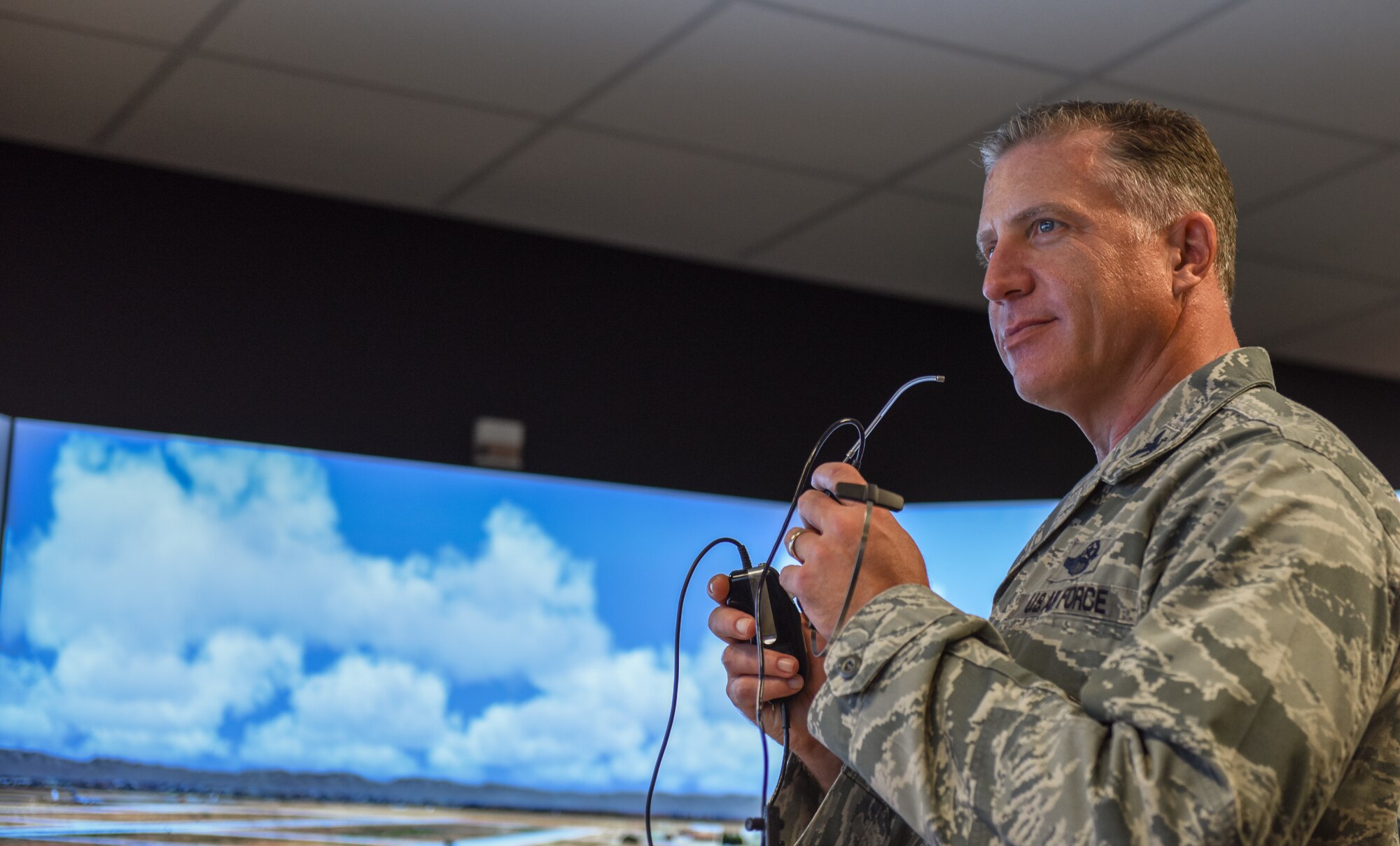 Col. David Eaglin, 39th ABW commander operates flight simulator
