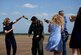 Lt. Col. Brent Green, 43rd FTS assistant director of operations, is sprayed with champagne and water by his family April 13, 2018, on Columbus Air Force Base, Mississippi. He is one of the original cadre in the Firebirds. It was shortly after the squadron expanded in 1999 from teaching only in the T-38C Talon to teaching all airframes that he was hired. Green has spent 22 years of his career in a full-time capacity learning or teaching in the T-37, T-38 and T-6A Texan II on Columbus AFB. (U.S. Air Force photo by Airman 1st Class Keith Holcomb)