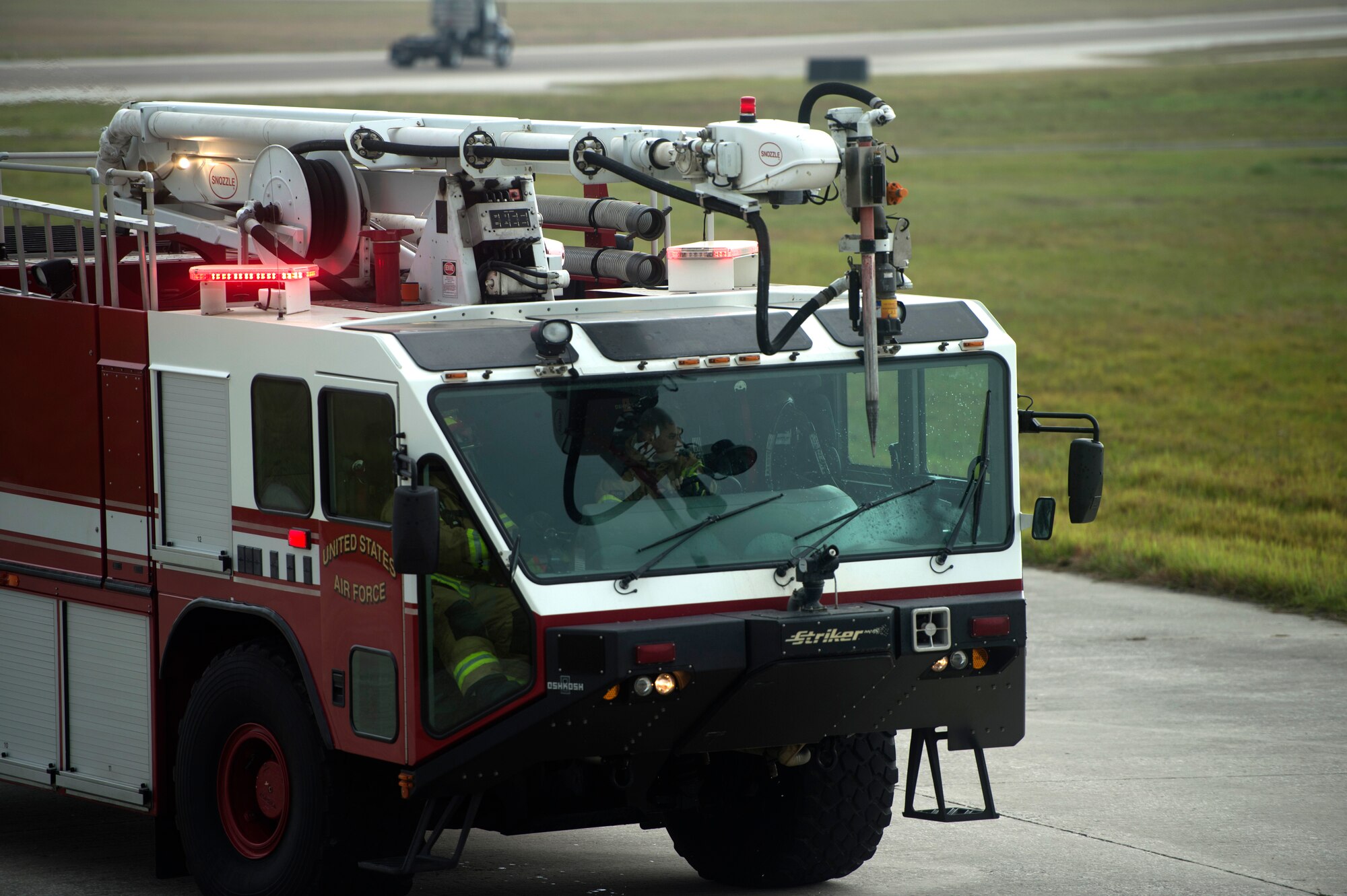 U.S Air Force Airmen assigned to the 6th Civil Engineer Squadron at MacDill Air Force Base, Fla., respond to a fire during an emergency response exercise April 10, 2018.