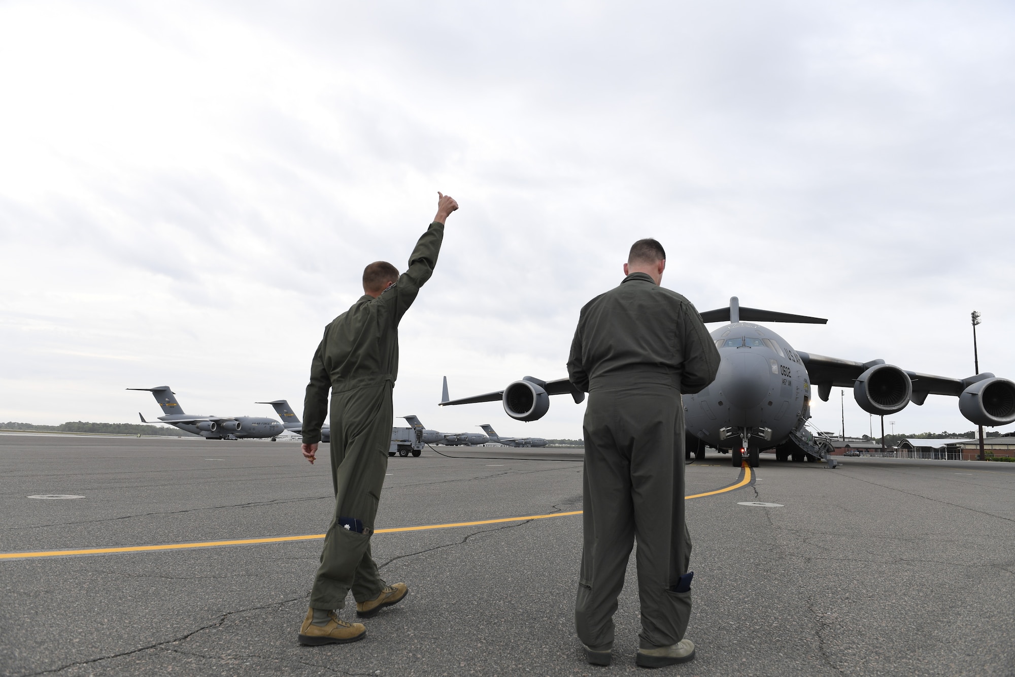 U.S. Air Force Lt. Col. Michael Lineberger (left), 145th Operations Group, and Col. Kevin Harkey commander of the 145th Operations Group, do a walk around check of a C-17 Globemaster III aircraft prior to flight at Joint Base Charleston, S.C., April 7, 2018. The airframe and crew are on the way to the North Carolina Air National Guard Base, Charlotte Douglas International Airport, April 7, 2018. The airframes’ homecoming will be marked by an Arrival Ceremony. The 145th Airlift Wing (AW) was selected to transition from the C-130 Hercules aircraft to the C-17 Globemaster III aircraft 18 months ago and the airframe will carry the units airlift mission into the future. The first two aircraft, of eight to come to the 145th AW, were previously assigned to the active duty wings at Joint Base Charleston, S.C. and Joint Base Lewis-McChord, Wash.