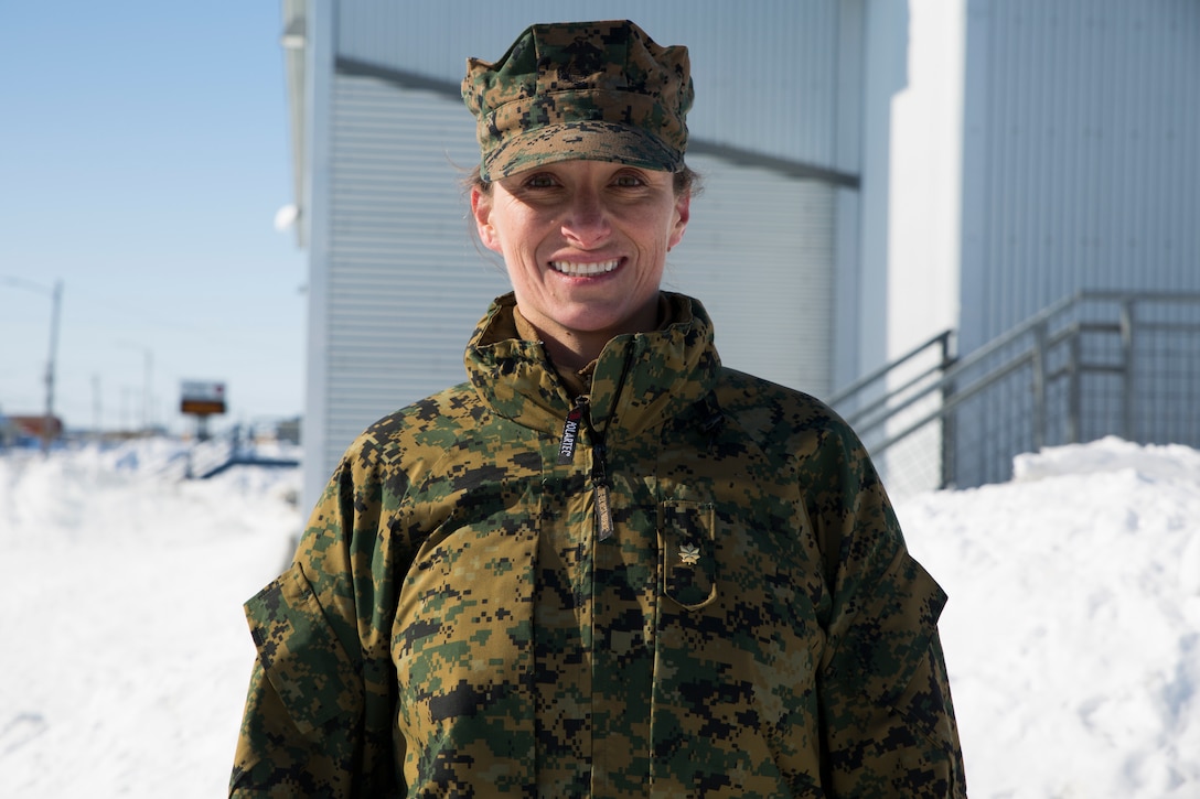 Maj. Lisbeth M. Andriessen, the Innovative Readiness Training program manager for Marine Forces Reserve, embraces the elements 26 miles above the Arcitc Circle in Kotzebue, Alaska, where she is overseeing the execution of IRT Arctic Care 2018 in the Northwest Arctic Borough, April 13-27, 2018.