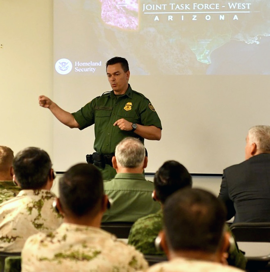 Rudy Karisch, Chief Patrol Agent, U.S. Border Patrol, Tucson Sector gives a brief to U.S. and Mexican generals about their responsibilities and daily business of guarding the border on the U.S. side. U.S. Army North (Fifth Army) and it’s subordinate units; Arizona, New Mexico and Texas National Guard along with U.S. Customs and Border Patrol; and Secretaría de la Defensa Nacional (SEDENA) of the Mexican Army met for the annual Border Commanders Conference to discuss current trends taking place along the U.S-Mexico border in Tucson, Ariz., April 3-6. The conference allows leaders to increase unity of effort and interoperability between the two nations while building on an already strong partnership.