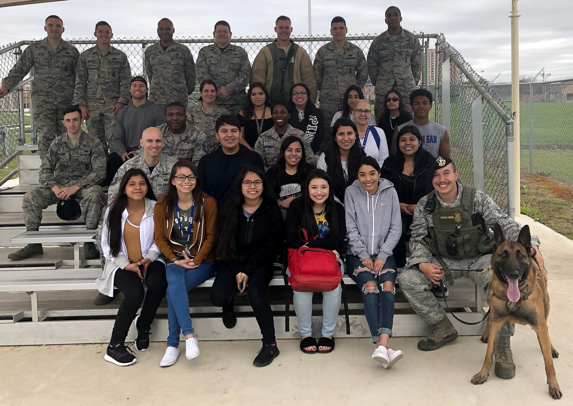 South San Antonio High School students and Joint Base San Antonio-Lackland Airmen pose for a photo during a Troops for Teens event at JBSA-Lackland, Texas, March 9, 2018. Troops for Teens, a joint SSAHS and Air Forces Cyber volunteer program, links Airmen mentors with teens. (U.S. Air Force photo by Tech. Sgt. Jamie Adimora)