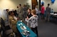 Team Shaw members converse during a Sexual Assault Prevention and Response (SAPR) office open house at Shaw Air Force Base, S.C., April 12, 2018.