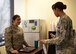 U.S. Air Force Capt. Lauren Kerby, 628th Air Base Wing Special Victims’ Counsel, left, speaks with Master Sgt. Tanya Wyatt, 20th Fighter Wing Equal Opportunity superintendent, during a Sexual Assault Prevention and Response office open house at Shaw Air Force Base, S.C., April 12, 2018.