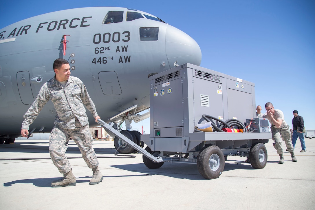 Several members from throughout Air Force Materiel Command (HQ AFMC/A4, Air Force Life Cycle Management Center, Air Force Research Lab, and contractors) descended on Edwards AFB to test out a new hybrid flightline generator the last week of March. They teamed up with members of the 412th Logistics Test Squadron to test their Hybrid Flightline Generator Technology Pathfinder on an F-16 fighter, KC-135 tanker and C-17 cargo plane.