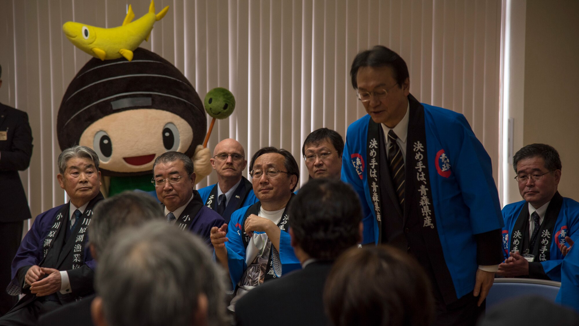 Akinori Eto, a member of the House of Representatives , bows at the Lake Ogawara Appreciation event in Tohoku Town, Japan, April 15, 2018. The event focused on community relations and fundamentals for the U.S. and Japan alliance. (U.S. Air Force photo by Airman 1st Class Collette Brooks)