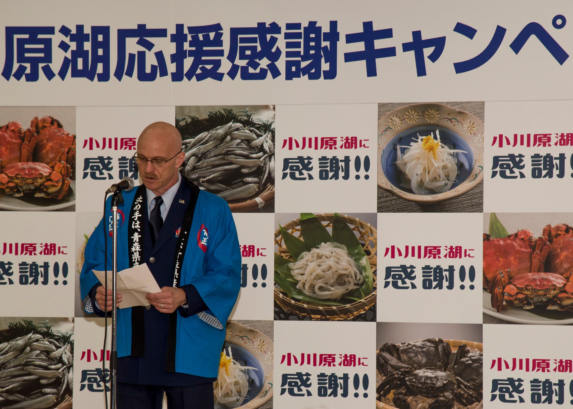 U.S. Air Force Col. R. Scott Jobe, the 35th Fighter Wing commander, thanks community members for their support of Misawa Air Base during his speech at the Lake Ogawara Appreciation event in Tohoku Town, Japan, April 15, 2018. Jobe spoke on the enjoyment Lake Ogawara brings to the community such as the cherry blossoms, a variety of lake festivals and the Wakasagi marathon. (U.S. Air Force photo by Airman 1st Class Collette Brooks)