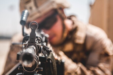 A U.S. Marine with Task Force Southwest (TFSW) provides security during a key-leadership engagement at Camp Nolay, Afghanistan, April 7, 2018. TFSW advises at the brigade level to enable the Afghan National Defense and Security Forces during near continuous combat operations to increase the stability for the local populace.
 (U.S. Marine Corps photo by Sgt. Conner Robbins/ Released)