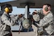 Airman 1st Class Geoffrey Saunders and Staff Sgt. Shawn White, 57th Aircraft Maintenance Squadron weapons loaders, load a bomb onto an F-16 Fighting Falcon fighter jet during a load crew competition at Nellis Air Force Base, Nevada, April 13, 2018. Load crew competitions provide weapons loaders throughout the 57th MXG the opportunity to display their weapons loading skills to their peers and superiors.(U.S. Air Force photo by Airman 1st Class Andrew D. Sarver)