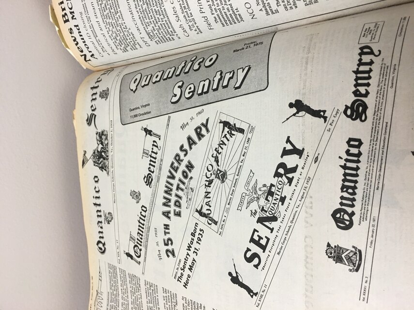 The logo of the Quantico Sentry (called the flag in the newspaper business) was redesigned numerous times and the different renditions are depicted here in the 25th anniversary edition of the paper.