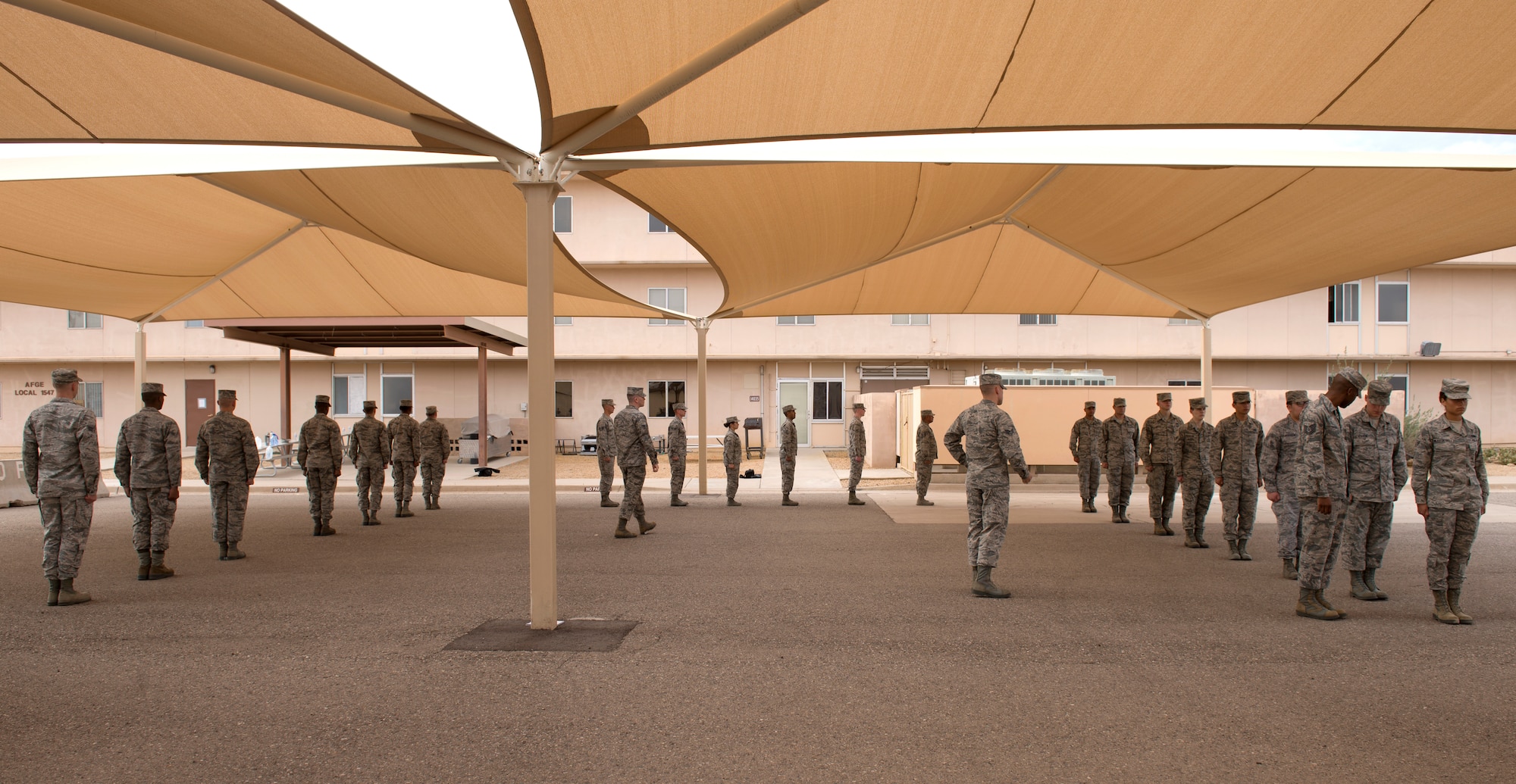 Members of Honor Guard units from Luke Air Force Base, Ariz., and other local areas, train under the tutelage of instructors from the official U.S. Air Force Honor Guard April 16, 2018. The instructors taught special formations, movements, and uniform maintenance techniques to the local Honor Guard members. (U.S. Air Force photo by Senior Airman Ridge Shan)