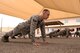 Members of Honor Guard units from Luke Air Force Base, Ariz., and other local areas, perform pushups under the direction of instructors from the official U.S. Air Force Honor Guard April 16, 2018. The Air Force Honor Guard visited Luke as part of an effort to enrich the skill sets of localized Honor Guard units at individual bases. (U.S. Air Force photo by Senior Airman Ridge Shan)