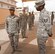 Airman 1st Class Jon Davila, Luke Honor Guard member, receives instruction on his stance in formation from Tech Sgt. Jerome Bryan, U.S. Air Force Honor Guard instructor, April 16, 2018, at Luke Air Force Base, Ariz. Air Force Honor Guard instructors will be at Luke teaching local Honor Guard members special formations and demonstrations until April 25, where the trainees will perform everything they’ve learned in a graduation ceremony. (U.S. Air Force photo by Senior Airman Ridge Shan)
