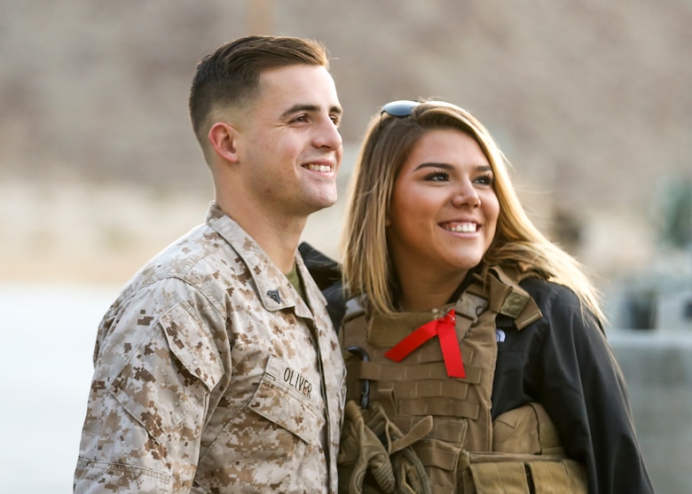 Sgt. John Oliver, vehicle commander, Alpha Company, 1st Tank Battalion, and his wife, Chelsea Oliver, participate in the unit’s Jane Wayne Spouse Appreciation Day aboard the Marine Corps Air Ground Combat Center, Twentynine Palms, Calif., April 3, 2018. The purpose of the event is to build resiliency in spiritual well being, the will to fight and a strong home life for the 1st Tanks Marines and their families. (U.S. Marine Corps photo by Lance Cpl. Rachel K. Porter)