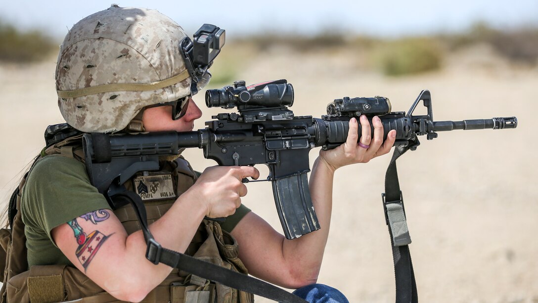 Brandi Pompa, wife of Sgt. Isaac Pompa, scouts, Alpha Company, 1st Tank Battalion, fires an M16A4 service rifle during the unit’s Jane Wayne Spouse Appreciation Day aboard the Marine Corps Air Ground Combat Center, Twentynine Palms, Calif., April 3, 2018. The purpose of the event is to build resiliency in spiritual well being, the will to fight and a strong home life for the 1st Tanks Marines and their families. (U.S. Marine Corps photo by Lance Cpl. Rachel K. Porter)