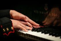 U.S. Marine Corps Cpl. Seungyen Shin, a musician keyboardist for the 1st Marine Division Band, performs “Rhapsody in Blue” during the 1st Marine Division Band’s 10th annual concert at the California Center for the Arts, Escondido, Calif., March 29, 2018